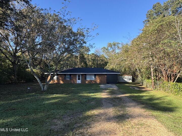 Property Photo:  620 Stevon Moore Street  MS 39577 