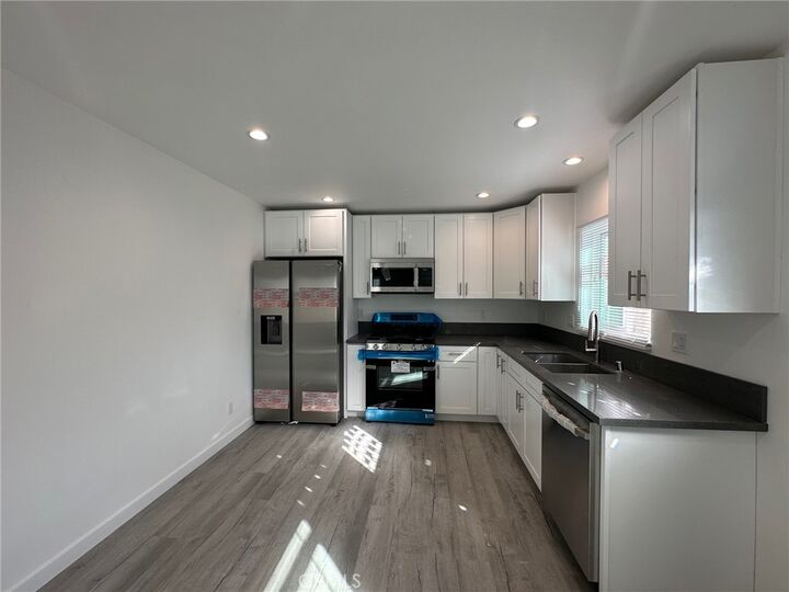 Property Photo:  7012 Bertrand Avenue  CA 91335 