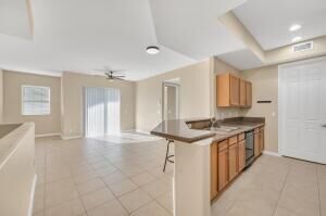 Property Photo: 10280 SW Stephanie Way 8203 FL 34987