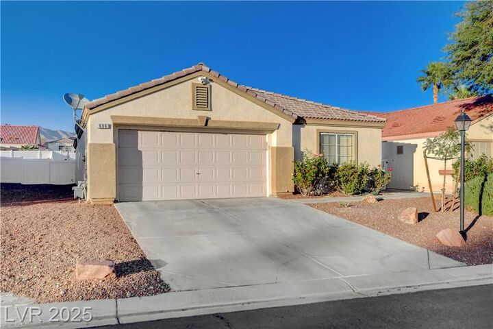 Property Photo:  606 Regal Robin Way  NV 89084 