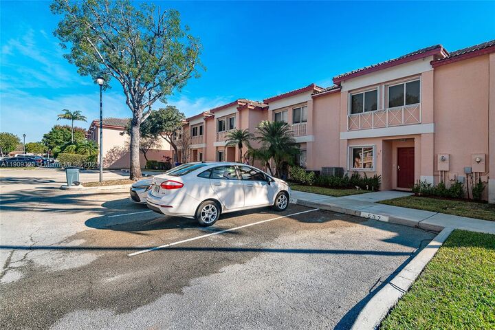 Property Photo:  597 NW 208th Dr 1  FL 33029 