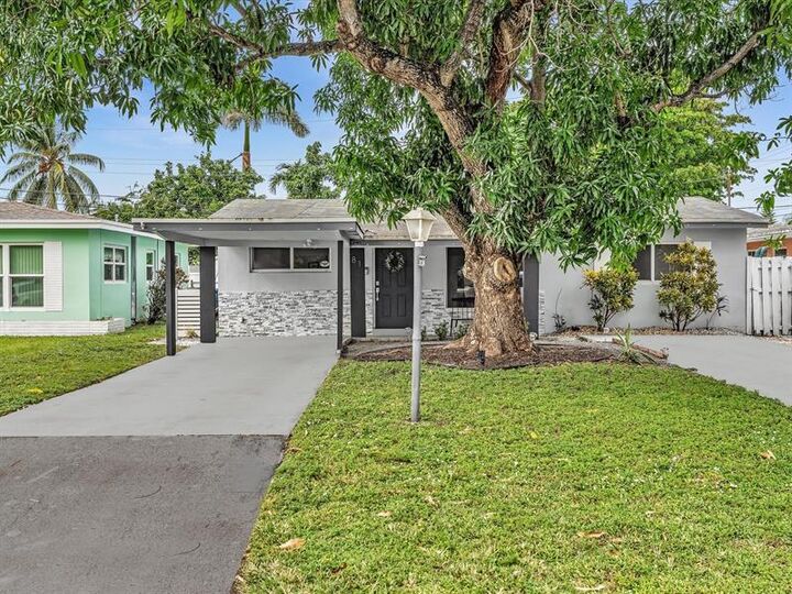 Property Photo:  81 NW 47th Ct  FL 33309 