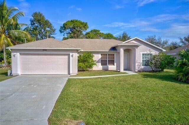 Property Photo:  2421 SE Gilbert Avenue  FL 34952 