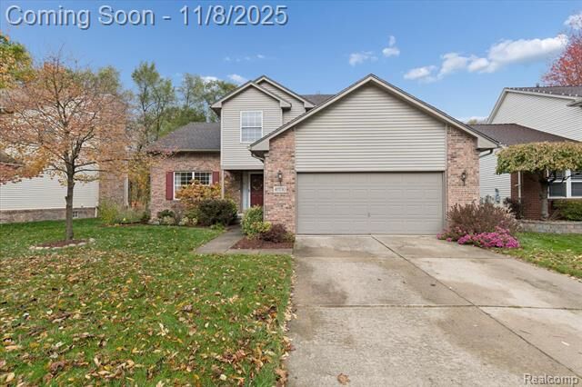 Property Photo:  41130 Greystone Boulevard  MI 48170 