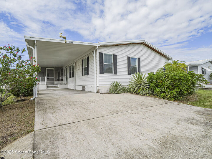 Property Photo: 7620 Boxelder Road E FL 32976