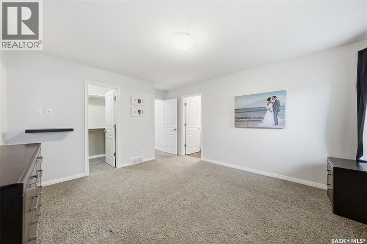 Property Photo:  223 Rempel Lane  SK S7T 0J3 