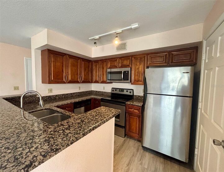 Property Photo:  7320 Westpointe Boulevard 526  FL 32835 