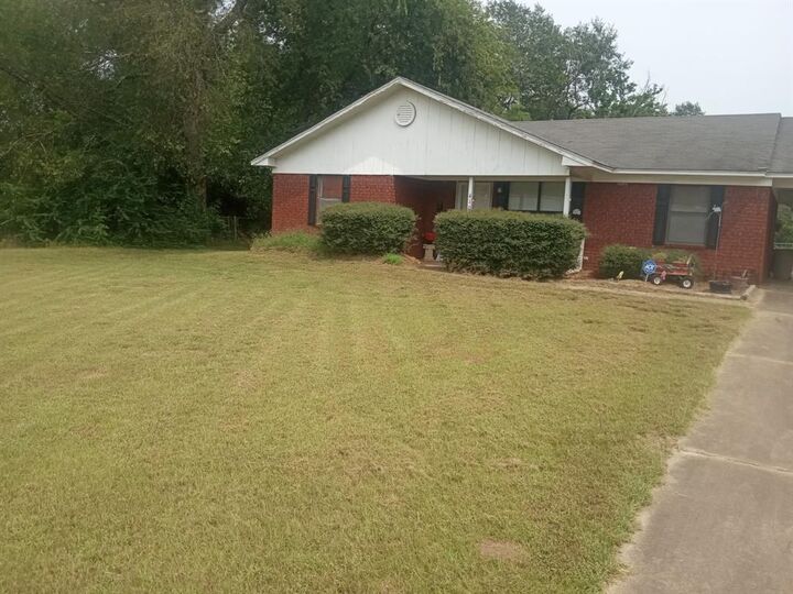 Property Photo: 410 S Texas TX 75686