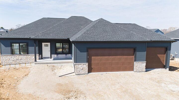 Property Photo:  909 Red Hawk Drive  WI 53563 