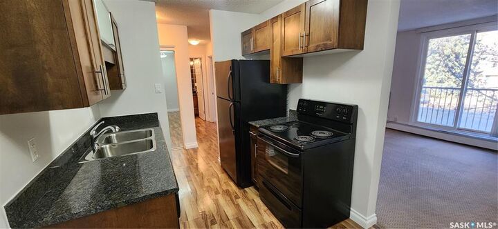 Property Photo: 115 Acadia Drive 10 SK S7H 4T8