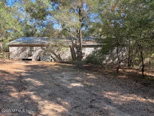 Property Photo:  6090 County Road 214  FL 32656 