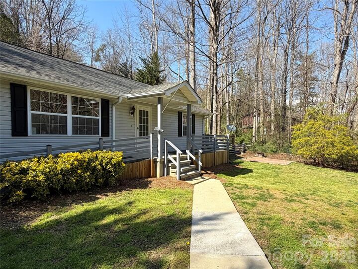 Property Photo:  107 Sugar Mill Woods Drive  NC 28790 