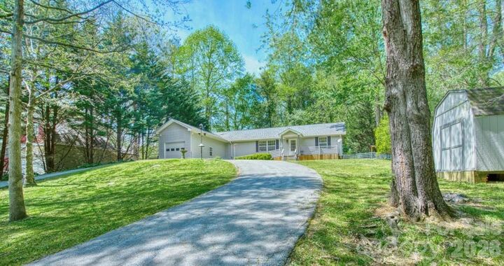 Property Photo:  107 Sugar Mill Woods Drive  NC 28790 