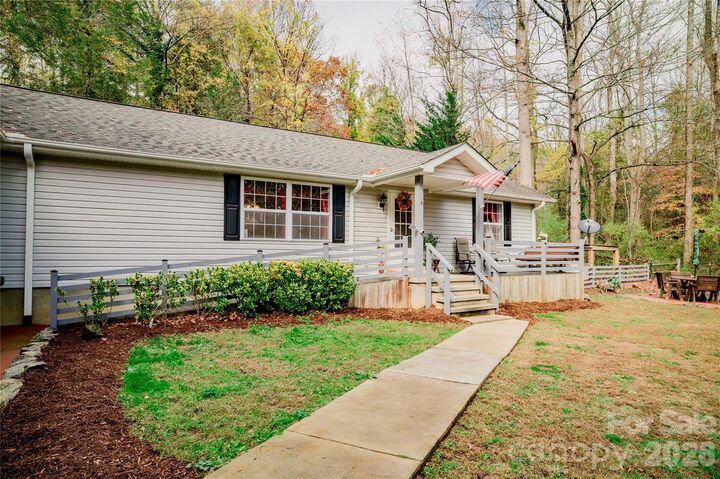 Property Photo:  107 Sugar Mill Woods Drive  NC 28790 