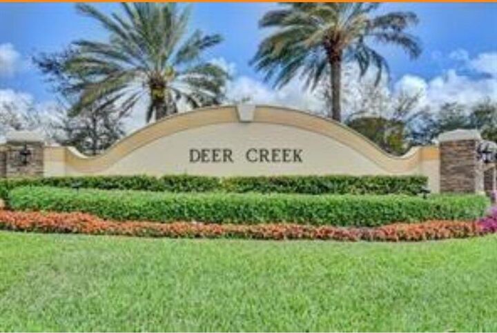 Property Photo:  2410 Deer Creek Country Club Blvd 202  FL 33442 