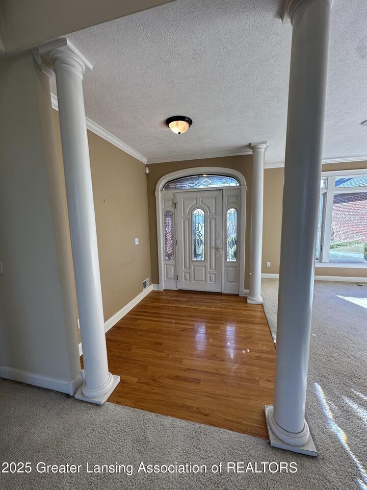 Property Photo:  7671 Royal Cove Drive  MI 48917 