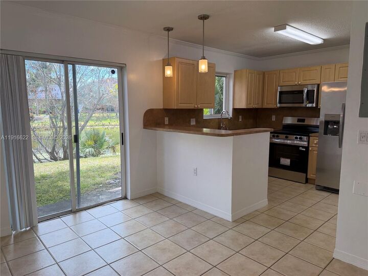 Property Photo:  2199 NW 77th Way 104  FL 33024 