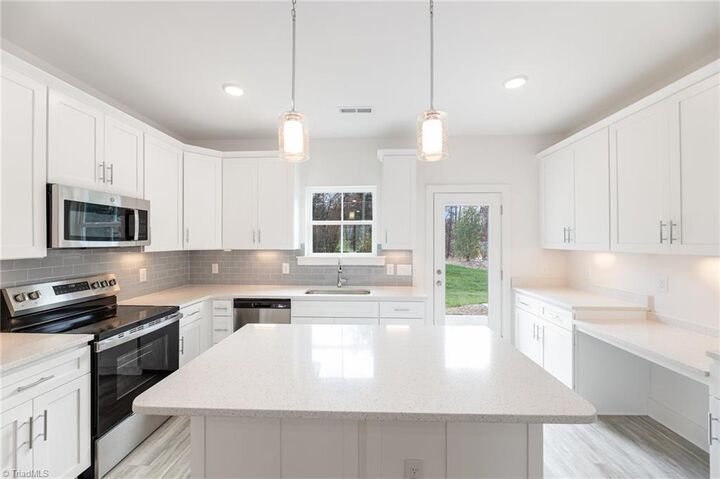 Property Photo:  4649 Canter Park Lane  NC 27410 