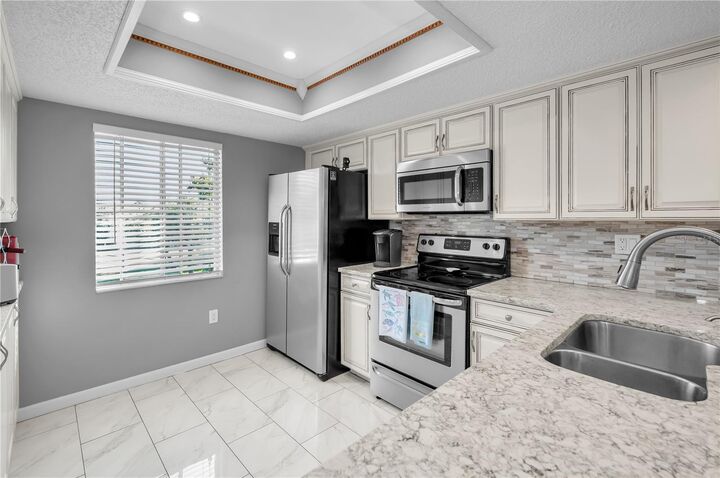 Property Photo:  110 Cypress Court 3-82  FL 34677 