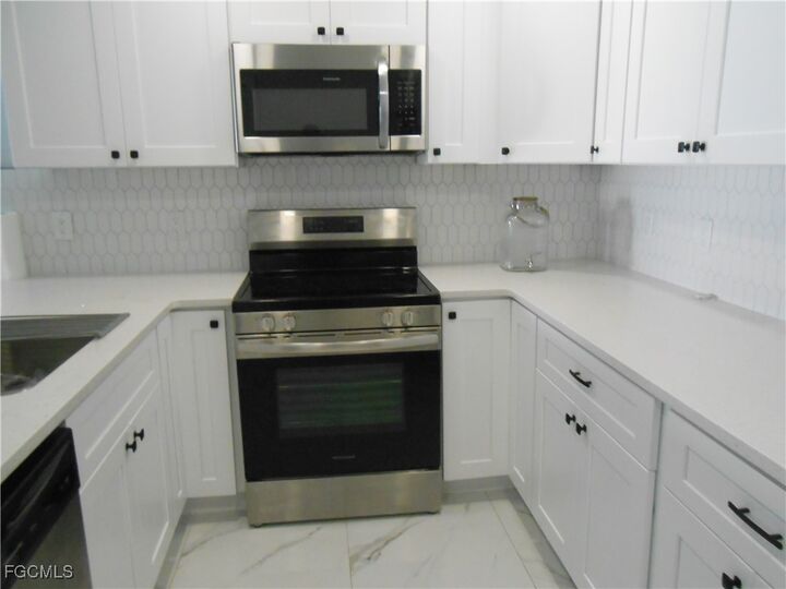 Property Photo:  636 Eisenhower Boulevard  FL 33974 