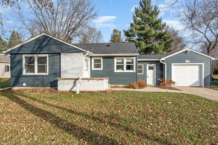 Property Photo:  1105 College Street  MN 55057 