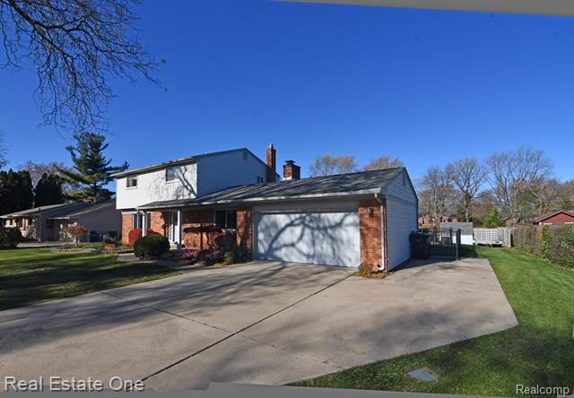 Property Photo:  210 Lange Drive  MI 48098 