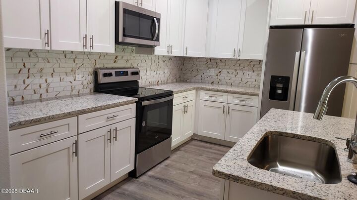 Property Photo:  44 Regency Drive B  FL 32164 