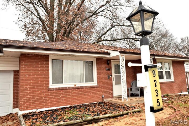 Property Photo:  9235 Filibert Drive  MO 63137 