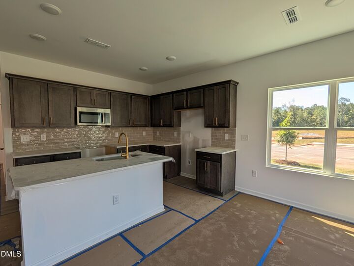 Property Photo:  1516 Mirth Court  NC 27571 