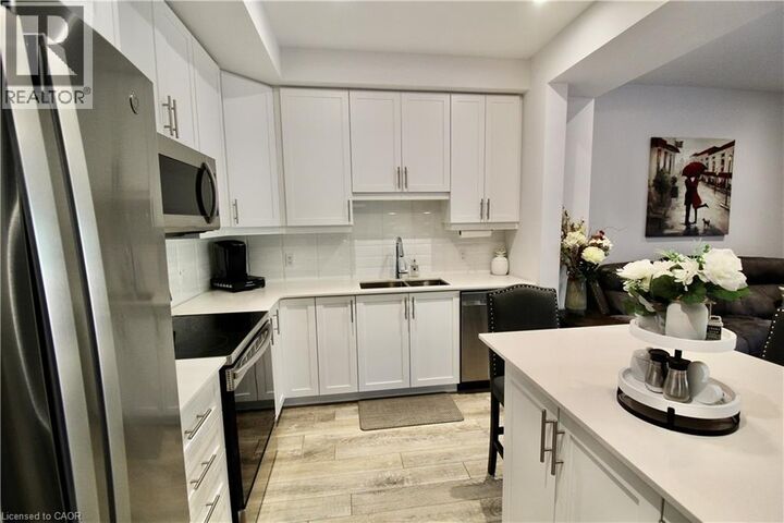 Photo de la propriété:  5080 Connor Drive 10  ON L3J 0T3 