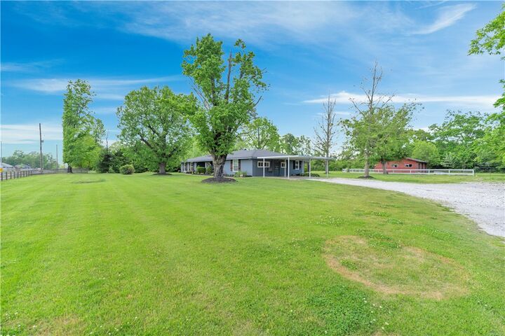 Property Photo:  1003 W Price Lane  AR 72758 