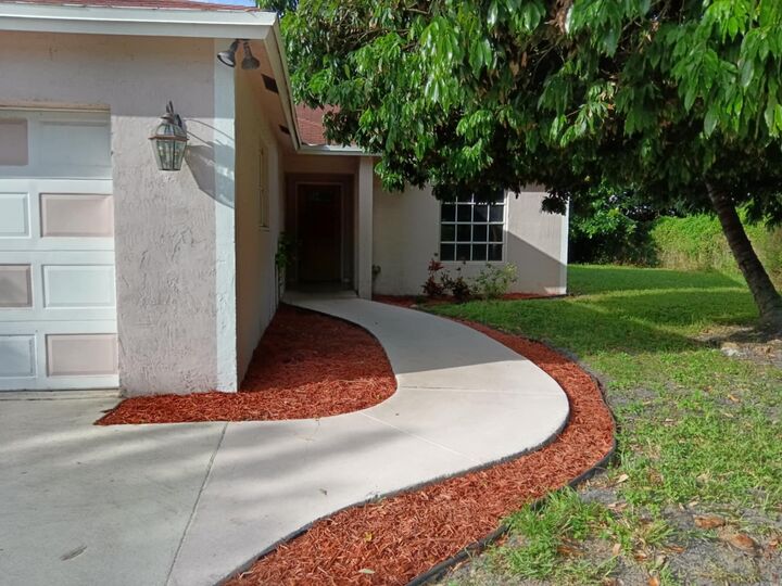 Property Photo:  1704 Boardman Avenue  FL 33407 