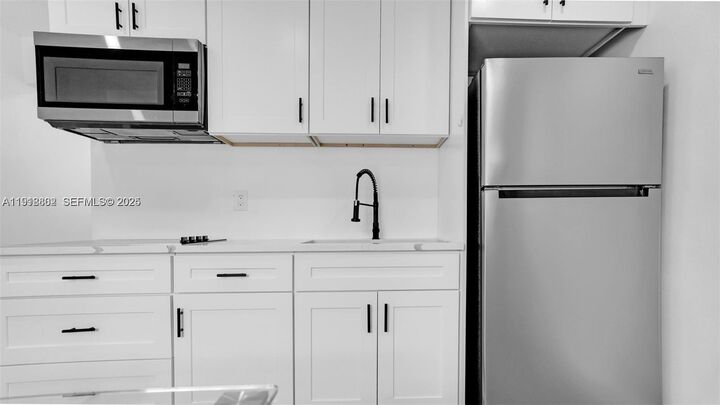 Property Photo: 32 SW 9th St 3 FL 33009