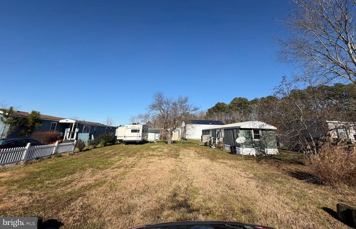 Property Photo: 33811 Palomino Drive DE 19975