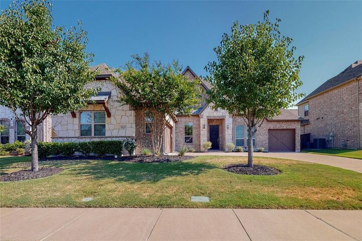 Property Photo: 1025 Calm Crest Drive TX 75087