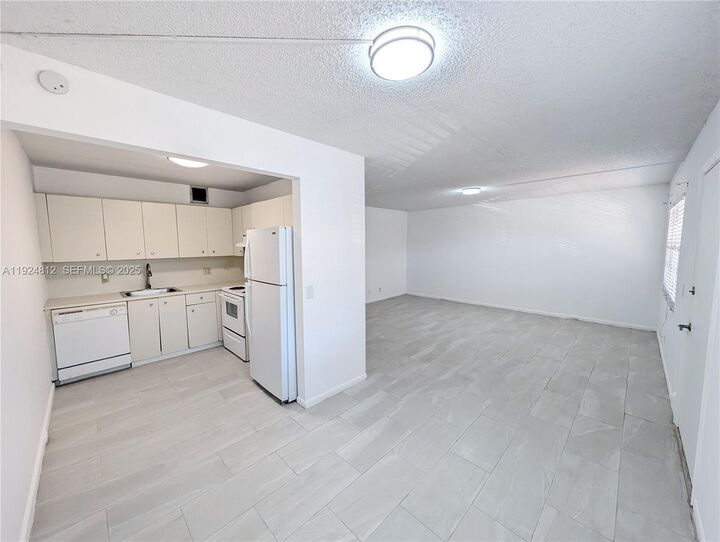 Property Photo: 850 SW 133rd Ter 202B FL 33027