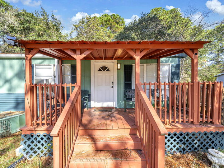 Property Photo: 9028 Larker Woods Drive FL 32566