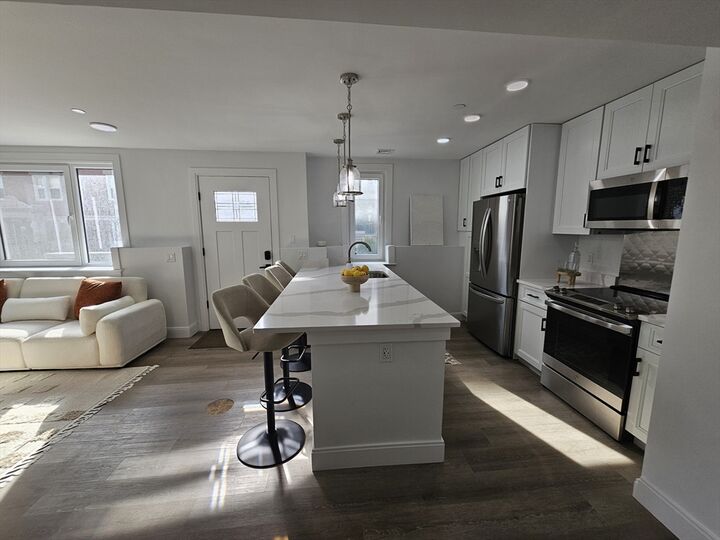 Property Photo:  64 Alpine St 104  MA 02119 