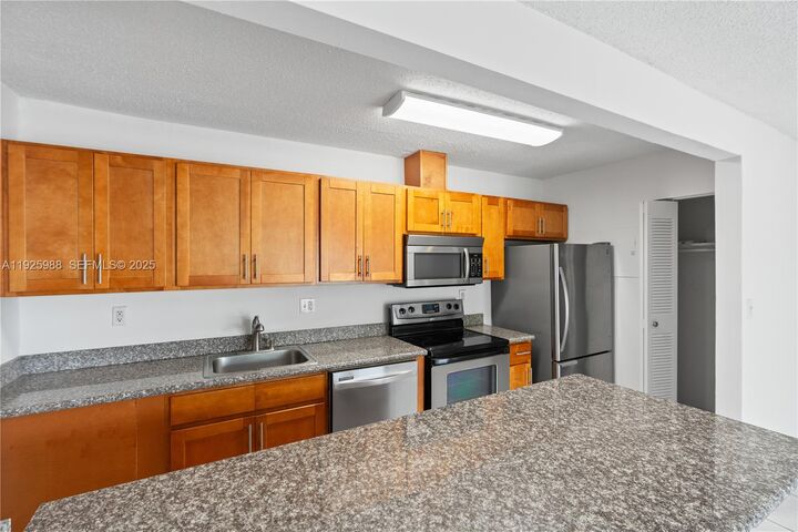 Property Photo:  4610 NW 79th Ave 2B  FL 33166 