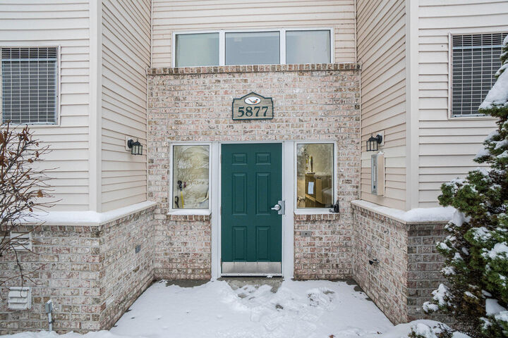 Property Photo:  5877 Crosswinds Drive  MI 49444 