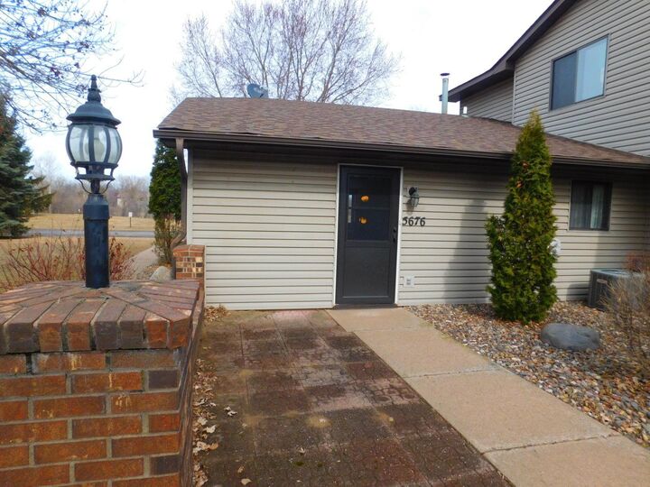 Property Photo:  5676 Brandlwood Court 53  MN 55110 