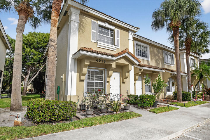 Property Photo: 6959 Blacksmith Way FL 33467