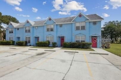 Property Photo:  201 Watts Lane D  FL 34743 
