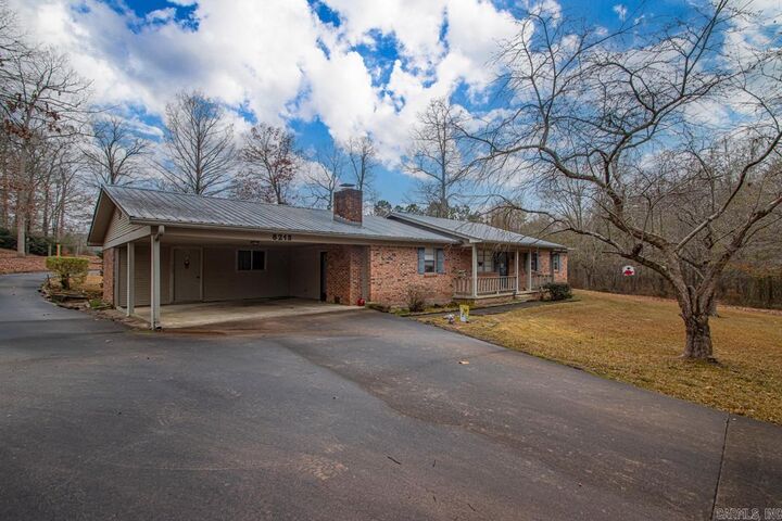 Property Photo: 8213 Russwood W Lane AR 72103