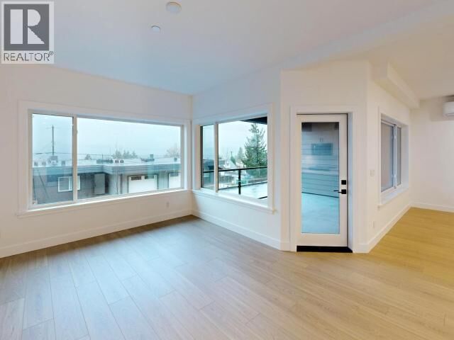 Property Photo:  C202-6900 Burnaby Street  BC  