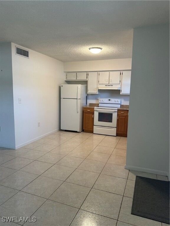 Property Photo:  3325 Airport Road N F1  FL 34105 