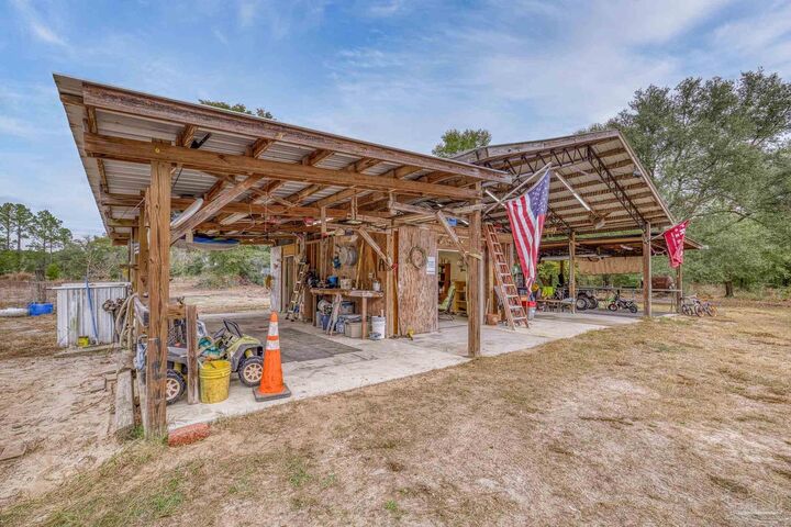 Property Photo:  10246 Nichols Lake Rd  FL 32583 