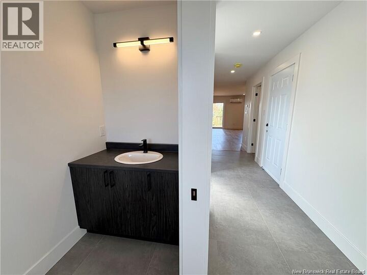 Property Photo:  1024 Elmwood Drive  NB E1H 2G9 