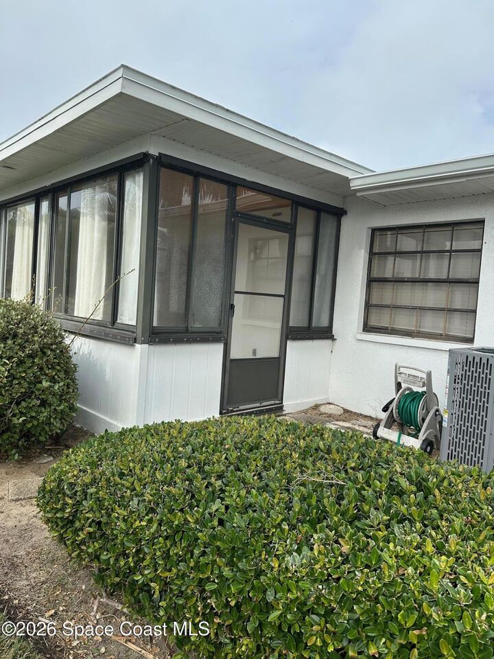 Property Photo:  335 Paradise Boulevard  FL 32903 