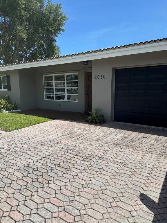 Property Photo:  2030 NE 28th Street  FL 33064 
